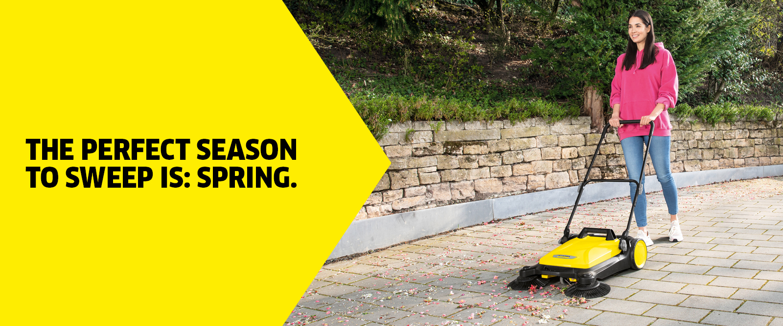 Spring cleaning push sweeper Cleaning in spring with a push sweeper