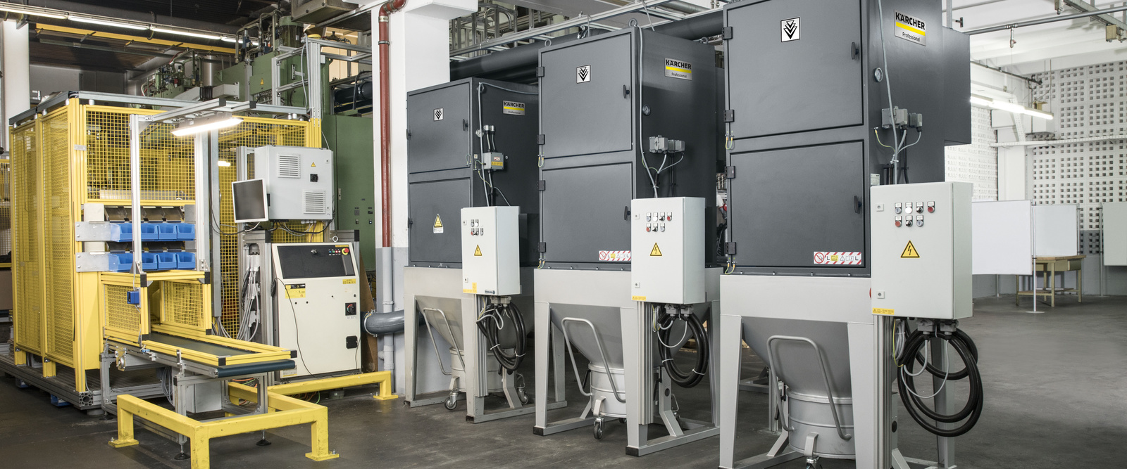 Kärcher industrial vacuums integrated into system technology Kärcher industrial vacuums integrated into system technology