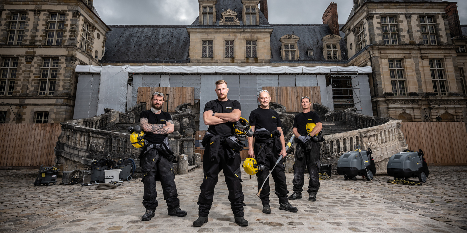 Kärcher's cleaning team Kärcher's workers pose at the Palace of Fontainebleau