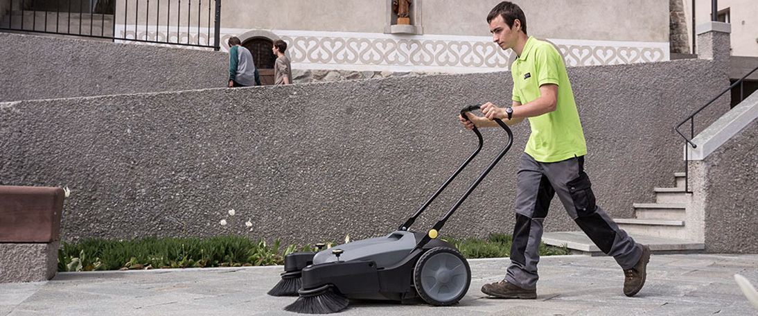 Kärcher walk-behind sweeper used outside of monastery Murezi uses a Kärcher walk-behind sweeper outside of the monastery