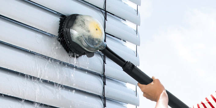 Roller shutter is cleaned with wash brush Kärcher wash brush
