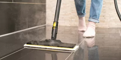 Cleaning the floor with Kärcher steam cleaner