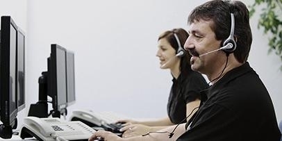 Contact us A Kärcher representative speaks with a customer by phone.