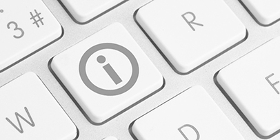 Frequently Asked Questions Photo of a computer keyboard with an Information key.